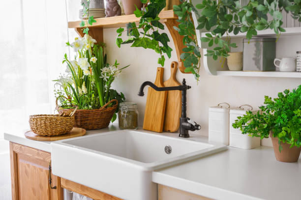 istock Cozy kitchen corner with fresh plants and a rustic sink for daily meal preparation, home interior 2200361024