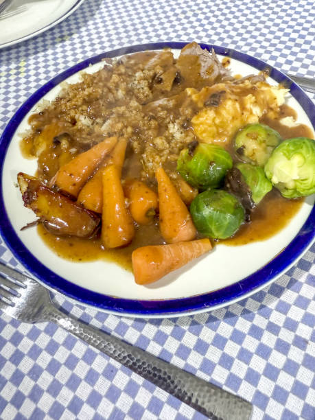 Typical British Sunday lunch of lamb and vegetables