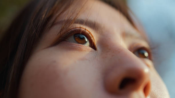 istock Close-Up Portrait Highlighting Woman's Gaze 2200366172