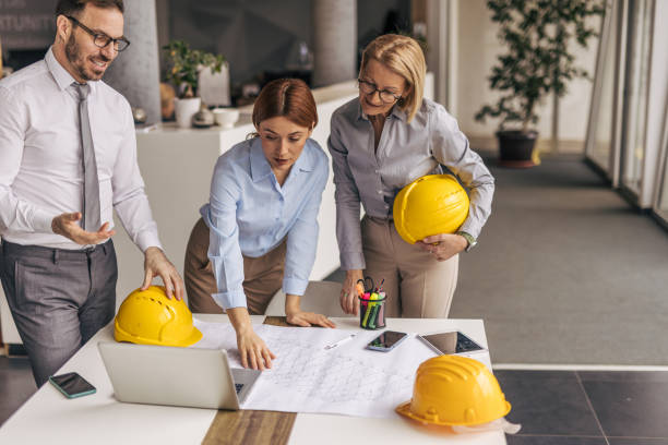istock Architects and engineers working on a building project in the office 2200371032