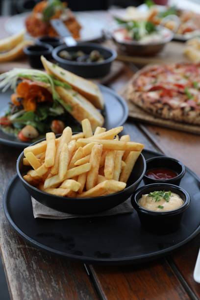 istock Crispy French Fries with Dips 2200372401