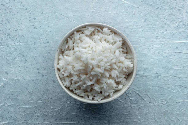 istock White rice, cooked. A bowl of boiled long grain rice, a simple side dish 2200372501