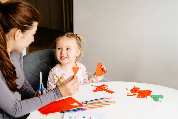 istock Mother and daughter bonding through arts and crafts 2200372799