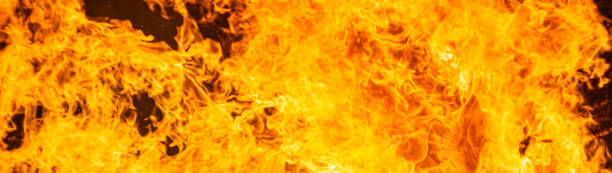 istock fire texture on black background, large fire photographed at night 2200373135