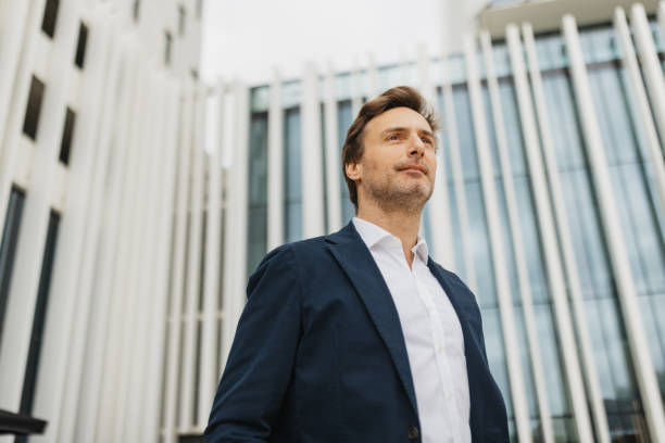istock Man in Thoughtful Pose at Artistic Location 2200374550