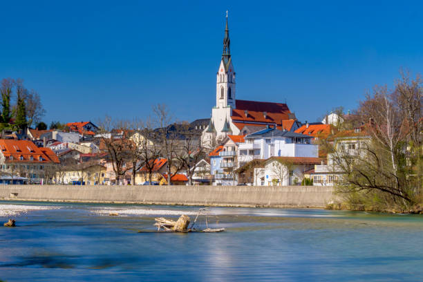 Townscape with Isar and Parish Church of the Assumption, Bad Toelz, Upper Bavaria, Bavaria, Germany, Europe