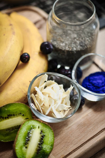 Fruit and Chia Seeds Arrangement on Wooden Tray Before Making Breakfast Smoothie