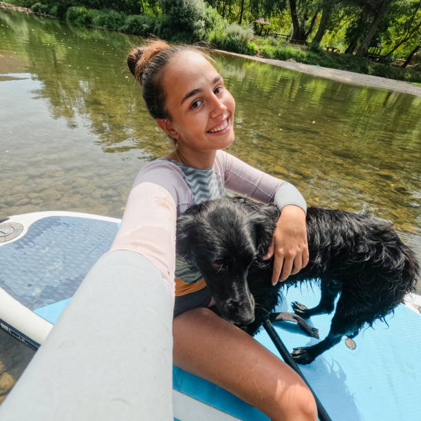 istock Paddleboarding on the river with my dog 2200381866