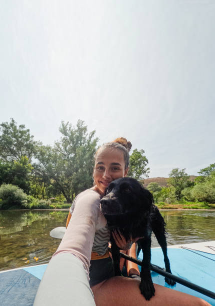 istock Paddleboarding on the river with my dog 2200381907