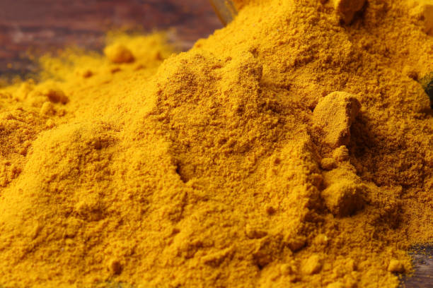 istock Turmeric Powder close up showing fine particles 2200386392