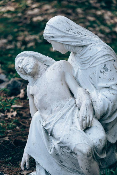 istock PIeta Blessed Virgin Mary Holding Jesus Religious Statue 2200386810