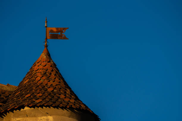 istock Beautiful Rustic Roof with Tile Shingles Against the Blue Sky: A Glimpse into Traditional Architecture in the Carpathian Region. 2200396449