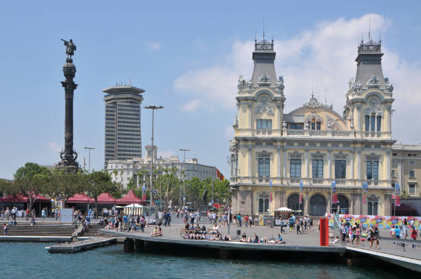 Catalonia, Spain - May 15, 2012: View of the port of Barcelona and monument to Christopher Columbus