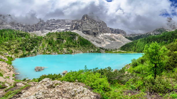 istock Lago di Sorapis in the Dolomites during an overcast springtime day 2200399625