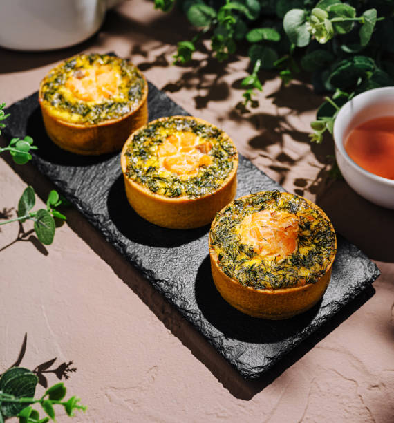 istock Savory herb tarts served on a dark slate plate 2200399787