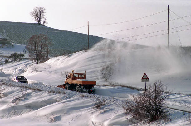 turbine clears snow-covered road