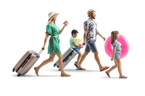 istock Family going on a summer vacation with suitcases and beach accessories 2200402396
