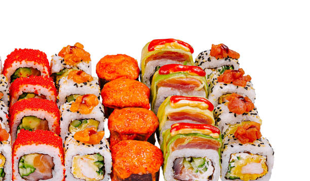 istock Sushi set combining various kinds of rolls with seafood and vegetables 2200402446