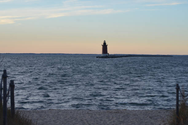 istock Delaware Breakwater Lighthouse Cape Henlopen during Sunset 2200406258