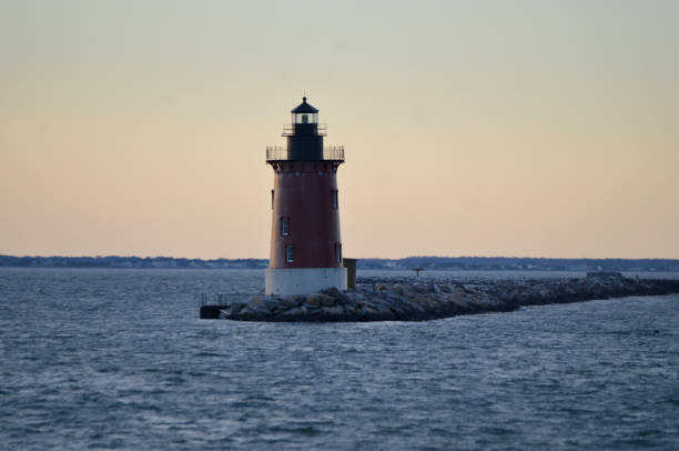 istock Delaware Breakwater Lighthouse Cape Henlopen Delaware Close up Sunset 2200406277