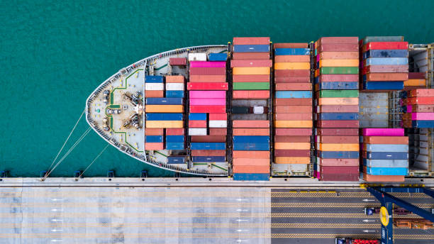 istock Cargo ships are unloading goods at a deep-sea port. 2200410972
