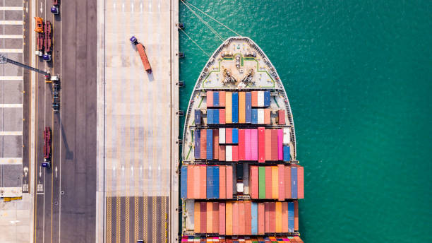 istock Cargo ships are unloading goods at a deep-sea port. 2200411017