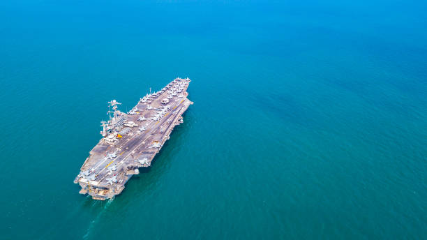 istock An aircraft carrier sails at sea. 2200411103