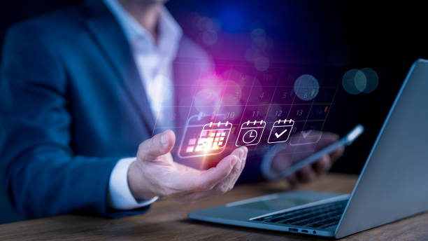 istock Business Planning Agenda Calendar: Work Schedule Concept, Entrepreneurs annotate the virtual calendar, workflow plan, and Organize important dates and timetables. Workplace time management 2200414295