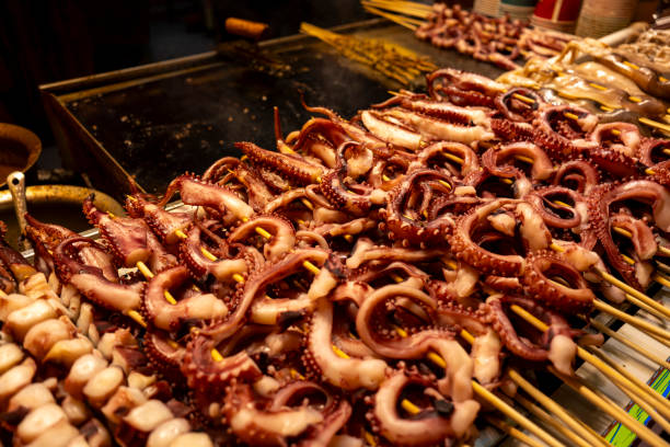 Squid skewers barbecue at night market