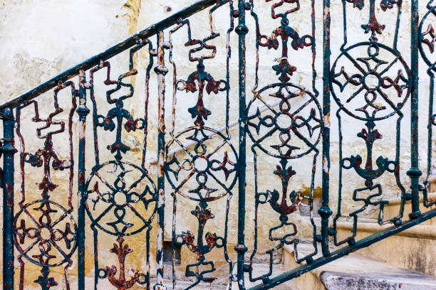 istock Rustic Wrought Iron Railing with Ornate Patterned Details in an Outdoor Setting 2200419873