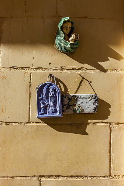 istock Religious Wall Displays Featuring Christian Art and Decorative Figures 2200420928