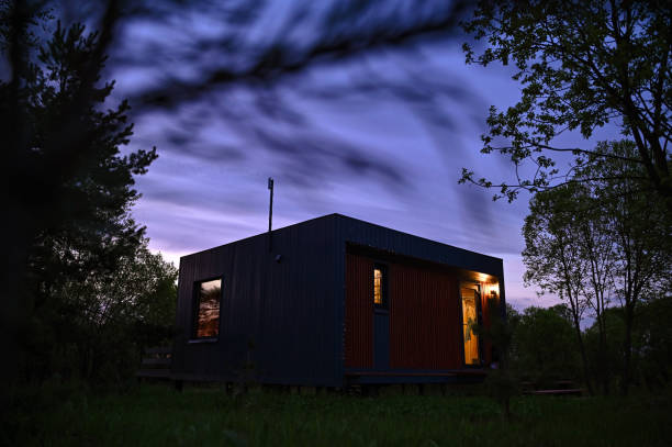 istock A small cozy modern country house in the evening 2200424207
