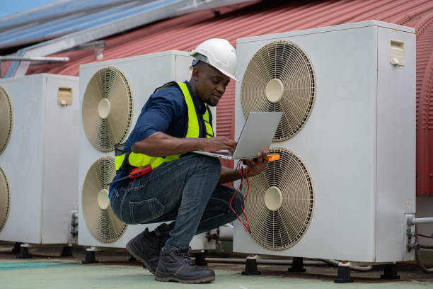 istock Engineers inspecting the air conditioning system in a large building or industrial facility. 2200427031