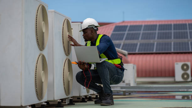 istock Engineers are inspecting the air conditioning system in a large building or industrial facility. 2200427161