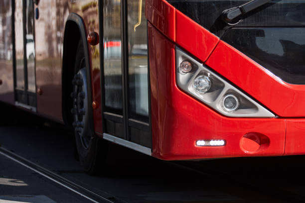 istock Red bus for public transportation on city streets. 2200427177