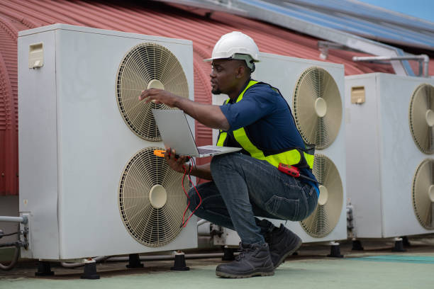 istock Engineers are inspecting the air conditioning system in a large building or industrial facility. 2200427186