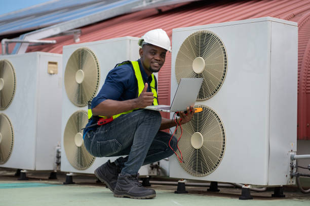 istock Engineers inspecting the air conditioning system in a large building or industrial facility. 2200427207
