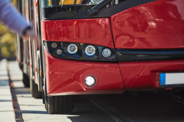 istock Red bus for public transportation on city streets. 2200427239