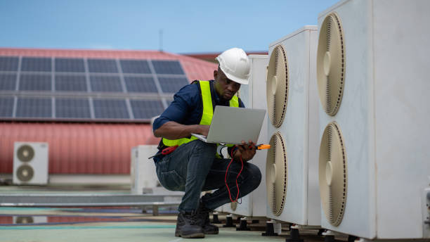 istock Engineers are inspecting the air conditioning system in a large building or industrial facility. 2200427445