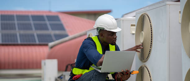 istock Engineers are inspecting the air conditioning system in a large building or industrial facility. 2200427489