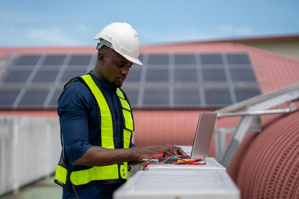 istock Engineers are inspecting the air conditioning system in a large building or industrial facility. 2200427565
