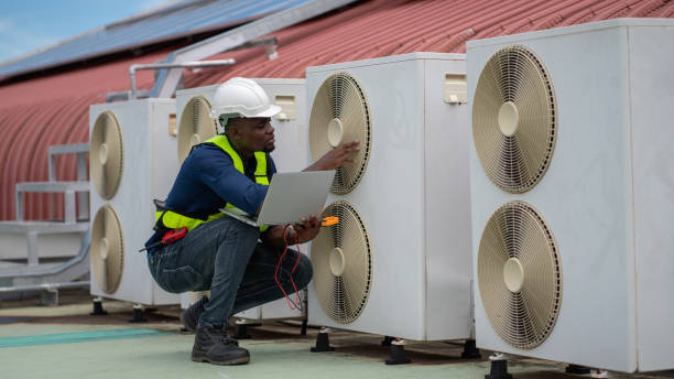 istock Engineers inspecting the air conditioning system in a large building or industrial facility. 2200427631