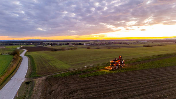 istock Sugar Beet Harvester in Scenic Sunset Field 2200427736