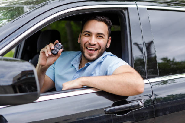 istock Happy Man Showing New Car Keys, Smiling 2200429666