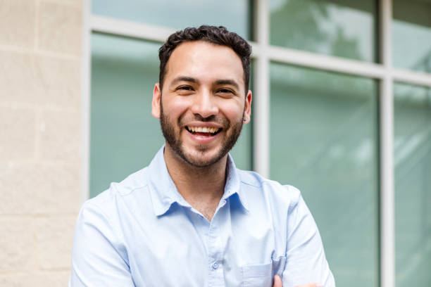 istock Happy Hispanic Man Smiling Outdoors, Casual Portrait 2200429672