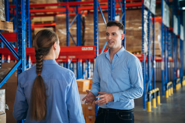 istock Warehouse worker working and checking the stock in the warehouse. .Factory manager using digital tablet check barcode in industry factory logistic. 2200429912