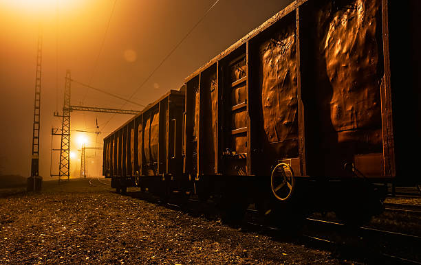 Obsolete railway station at foggy night