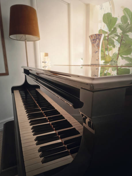 istock Vintage piano in a cozy room 2200431814