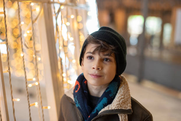 istock 9 years old boy in christmas scene 2200431891