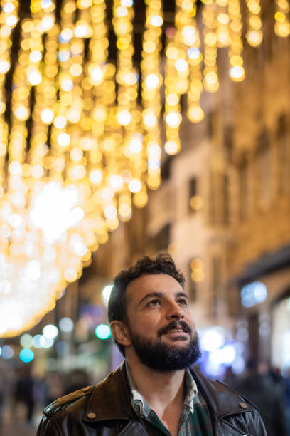 istock 42 years old man in christmas scene in the night 2200431918